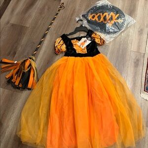 Orange and Black Witch Costume for Kids s M brand new it comes with the broom